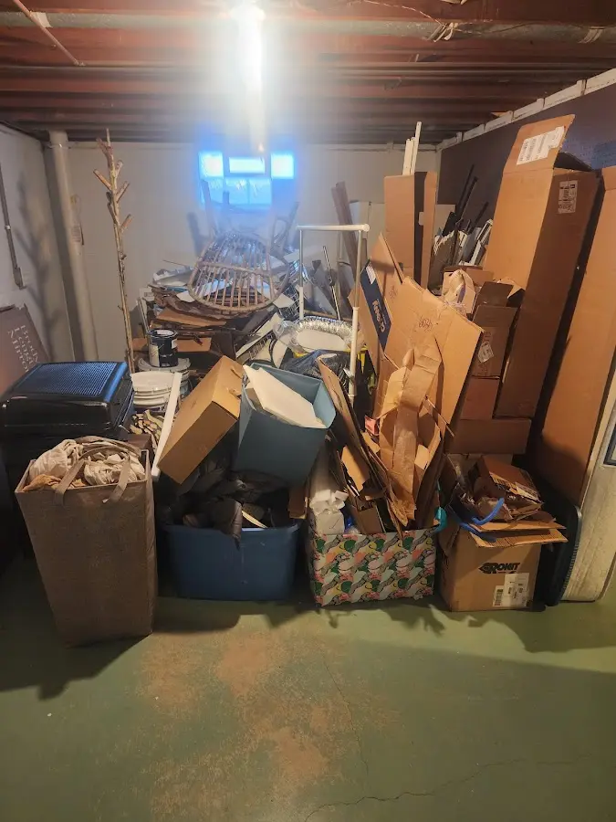 Roll-off dumpster container at job site for Yard Waste Dumpster Rental in Laplace